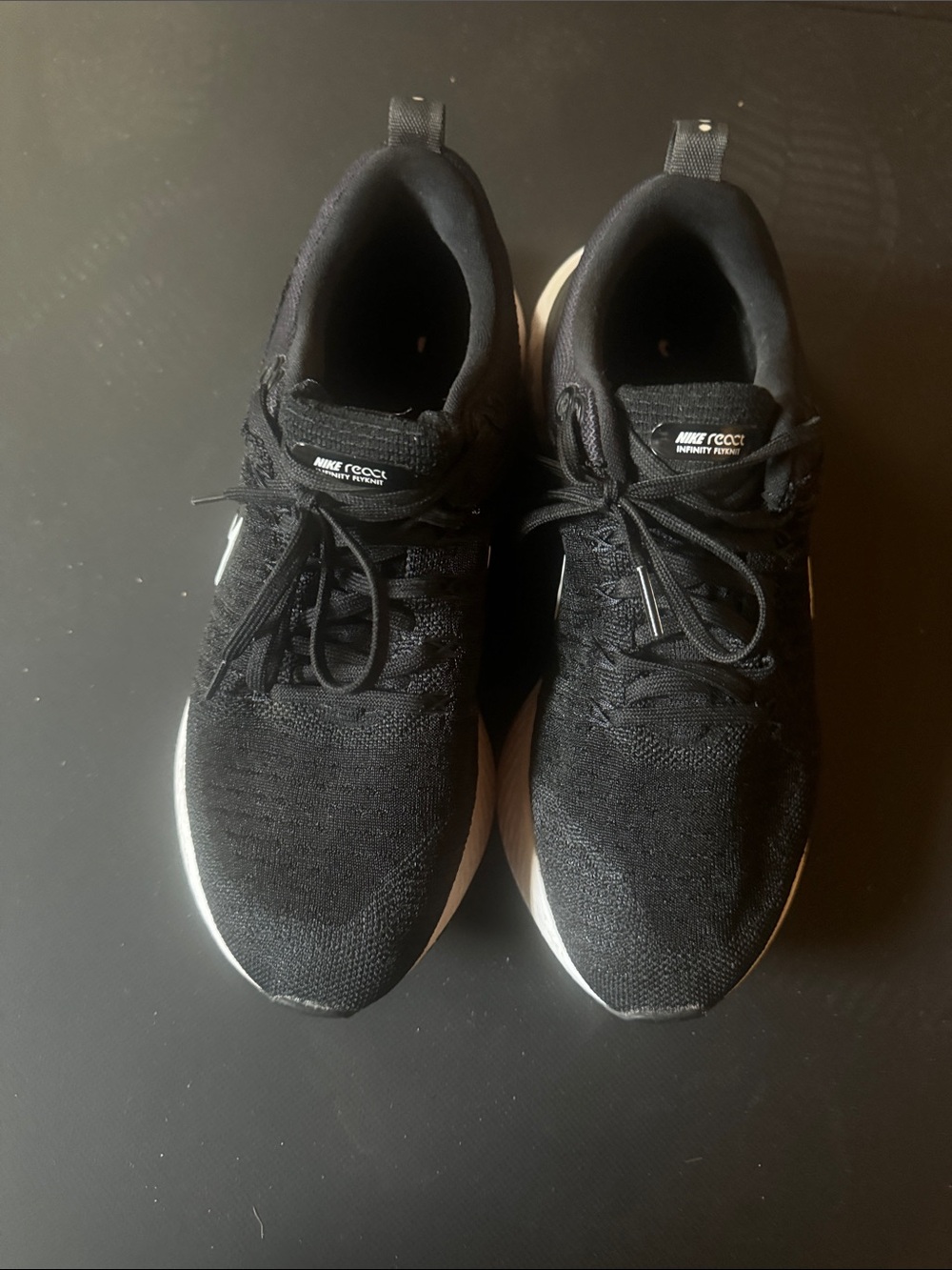 Nike Black and White Flyknit Running Sneakers